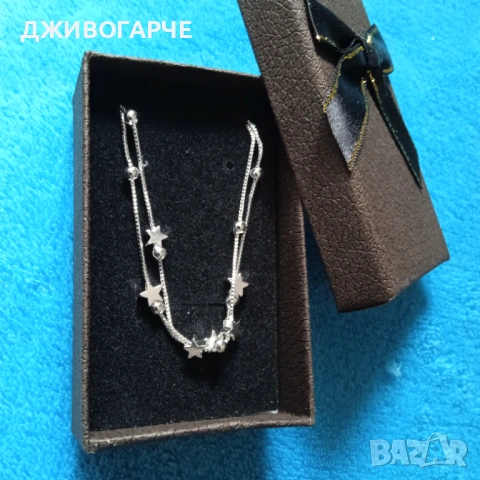 Нова, сребърна гривна с топче-оризче. В подаръчна кутия.