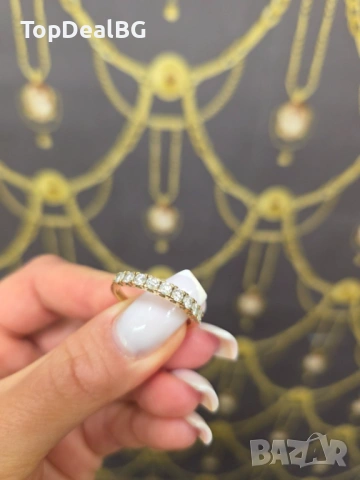 Златен пръстен с диамант