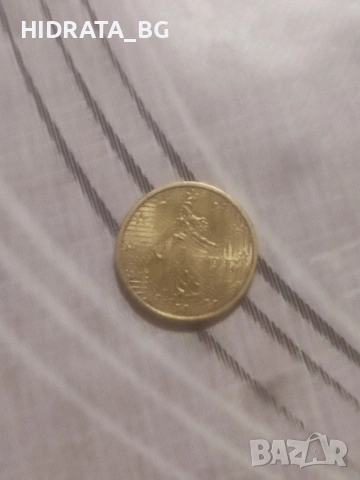 Монета 10 цента Франция 2003 година, 