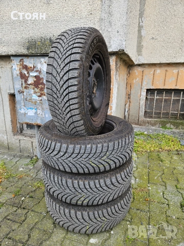 4 броя зимни гуми Semperit 195/65/15 с железни джанти 5х112