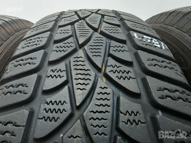 4бр зимни гуми 215/70/16 DUNLOP L05814 , снимка 2 - Гуми и джанти - 54709600