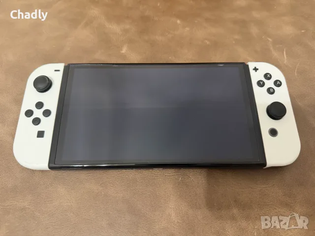 Nintendo Switch OLED White + 512GB + 12 игри + Допълнителни Joy-Con, снимка 2 - Nintendo конзоли - 55316833