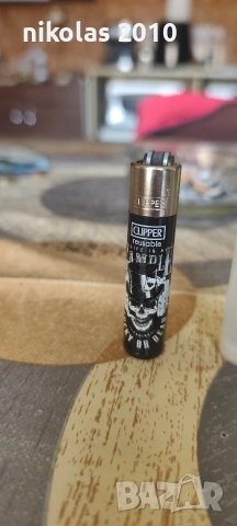 Колекция от 37 оригинални запалки Clipper + подарък дисплей (поставка), снимка 2 - Колекции - 54563525