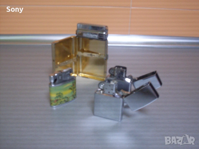 Стари колекционерски бензинови запалки.