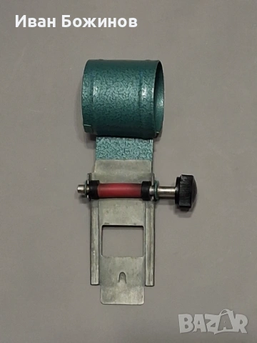 Подаваща ролка за прожекционен апарат.