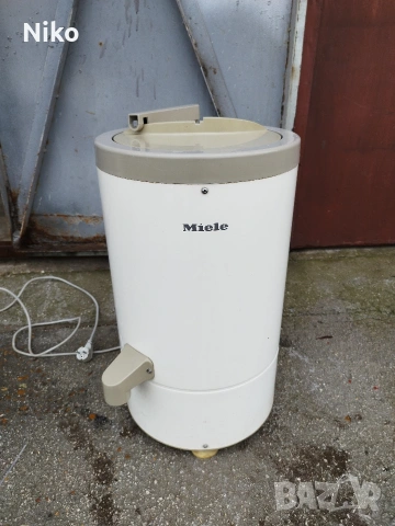 Центрофуга за дрехи Miele