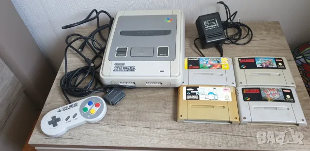 Конзола Super Nintendo с четири дискети