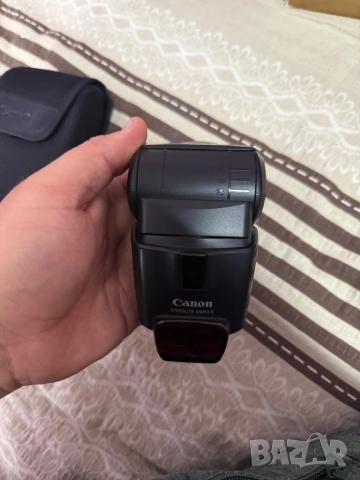 Продавам външна светкавица Canon Speedlite 430EX II – Перфектно осветление за впечатляващи снимки, снимка 16 - Светкавици, студийно осветление - 54111664