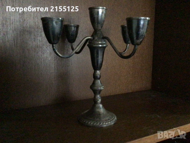 Красив стар ,сребърен свещник.
