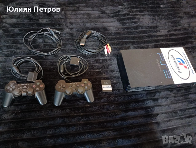 Продавам Пс2 хакната с оригиналните и кабели 2бр джойстици мемори карта и 11бр игри