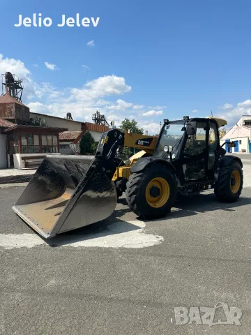 Телескопичен товарач Caterpillar TH337C