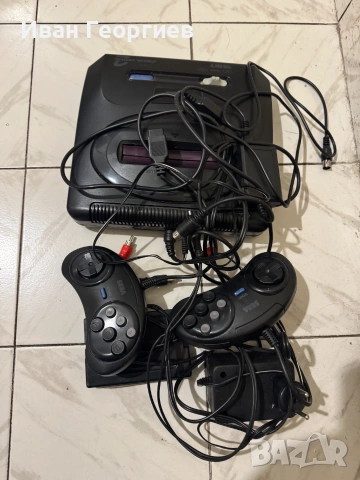 Видео конзола  SEGA Mega Drive 2 + игра Монако GP II