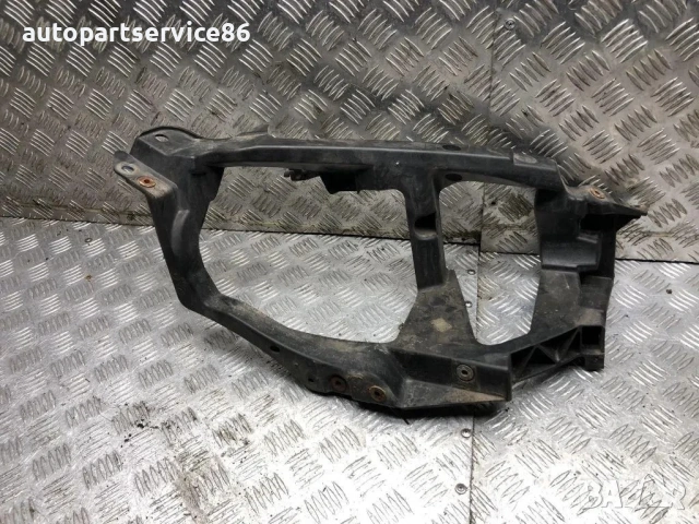 Конзола / държач за преден десен фар за Mitsubishi Colt (2003-2008) MN105060