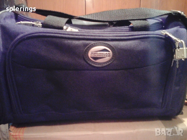 Продавам черна пътна чанта 40 х 25 х 25 см.