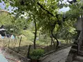 ЕКСКЛУЗИВНО! Масивна двуетажна къща с гараж и двор в с. Брежани, община Симитли, снимка 6