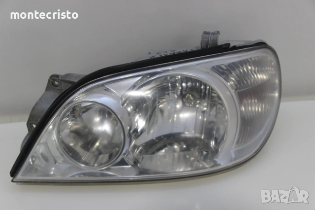 Ляв фар Kia Carnival II (2001-2007г.) 0K54E51040A