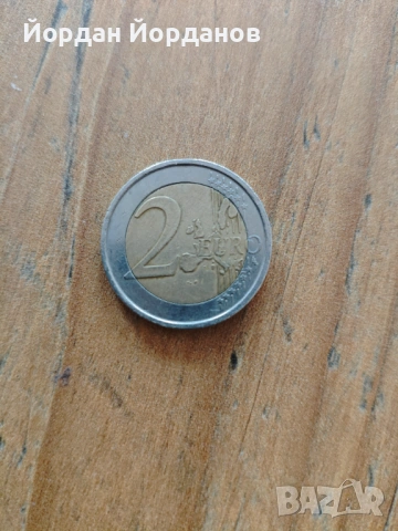 монета 2 евро испания 1999 година