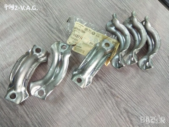 811253269A**NEU**VAG**AUDI 100**ДЪРЖАЧ АУСПУХ**AUDI VW**, снимка 2 - Части - 55221456
