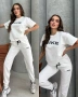 Дамски спортен комплект от две части – тениска и долнище "Nike", снимка 2