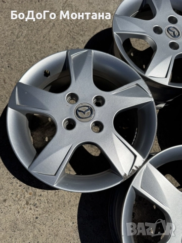Алуминиеви джанти Mazda 15”, снимка 5 - Гуми и джанти - 55361979
