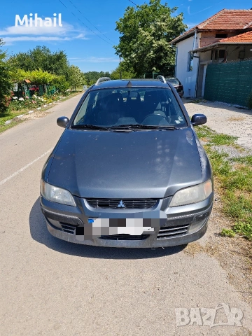 Mitsubishi Space Star (2005) компактен ван (мини MPV)