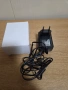 захранващ адаптер (зарядно устройство) с изходно напрежение 12V и ток 1000mA (1A)., снимка 1