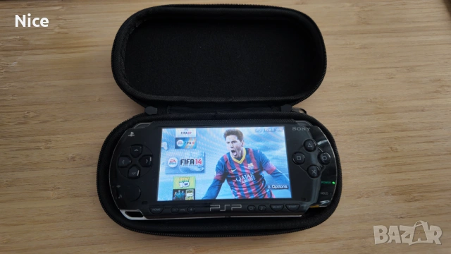PSP + 64GB карта с игри + нова батерия + зарядно + калъф 