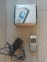 Това е класически мобилен телефон Sony Ericsson J210i в сребрист цвят. Моделът разполага с малък цве, снимка 1