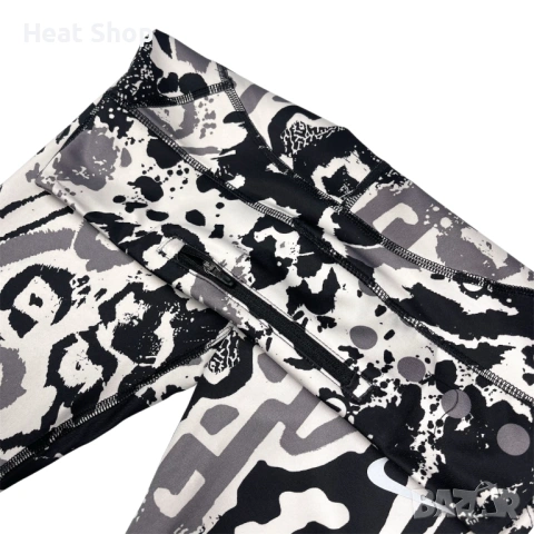 Дамски клин Nike Fast 7/8 Animal Print Performance Running Tights, снимка 4 - Клинове - 54689263