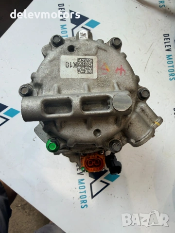 977E1-AT100 компресор за климатик от Hyundai Kona SX2 1.6 GDI Hybrid, двигател G4LL, 141 кс., автома, снимка 3 - Части - 54743255