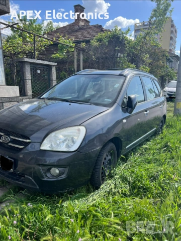 Kia Carens 2.0 CRDi, снимка 6 - Автомобили и джипове - 54903108