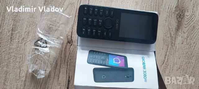 Телефон Alcatel 