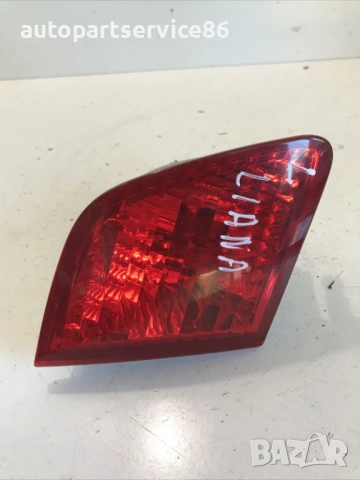 Къс светлина за мъгла задна лява страна за Suzuki Liana 1.4 Ddis (2004) 36250-54G0