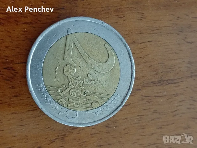 Това е германска монета от 2 евро, изсечена през 2002 година.