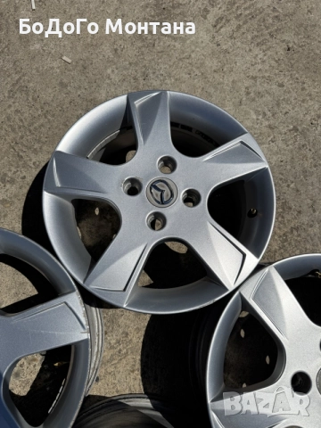 Алуминиеви джанти Mazda 15”, снимка 4 - Гуми и джанти - 55361979