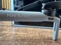 Продавам DJI Mini 5 Pro Fly More Combo (DJI RC 2), Гаранция, снимка 8