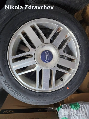 Продавам комплект 4 бр. летни гуми с лети джанти за Ford (5 болта)
