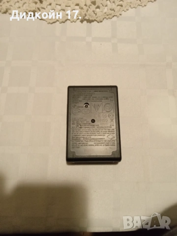 Зарядно устройство за Сони фото, снимка 2 - Батерии, зарядни - 54012419