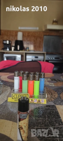 Колекция от 37 оригинални запалки Clipper + подарък дисплей (поставка), снимка 18 - Колекции - 54563525