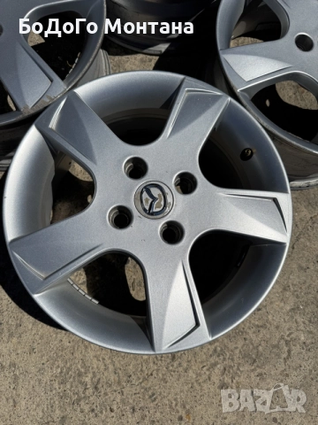 Алуминиеви джанти Mazda 15”, снимка 2 - Гуми и джанти - 55361979