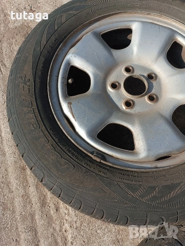 Продавам железни джанти с гуми Субару Форестер 195/65/15, снимка 3 - Гуми и джанти - 54168877