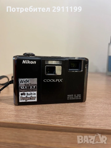 Фотоапарат Nikon 12.1Mp / Built-in Projector с подаръци, снимка 2 - Фотоапарати - 54625931