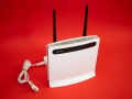 HUAWEI B593s 4G LTE SIM рутер Cat6 300Mbps Wi-Fi + Телефонна станция, снимка 1