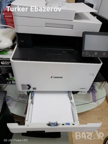 бял принтер Canon 