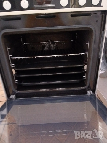 Като нова свободно стояща печка с индукционни котлони Voss с две години гаранция!, снимка 3 - Печки, фурни - 54170269