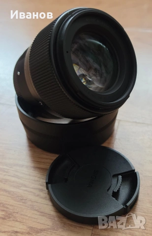 Обектив Sigma 56mm F1.4 Sony E-mount + филтър Walimex Pro Slim MC UV 55mm | Перфектно състояние