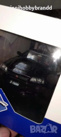 Nissan Skyline GtR R 34 1.18 Solido , снимка 2 - Колекции - 54484436