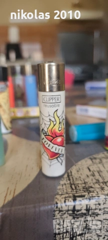 Колекция от 37 оригинални запалки Clipper + подарък дисплей (поставка), снимка 11 - Колекции - 54563525