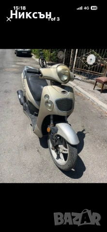 Скутер 125 кубика honda 