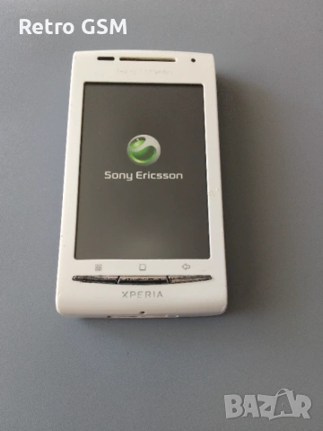 Sony Ericsson Xperia X8 (E15i) + зарядно